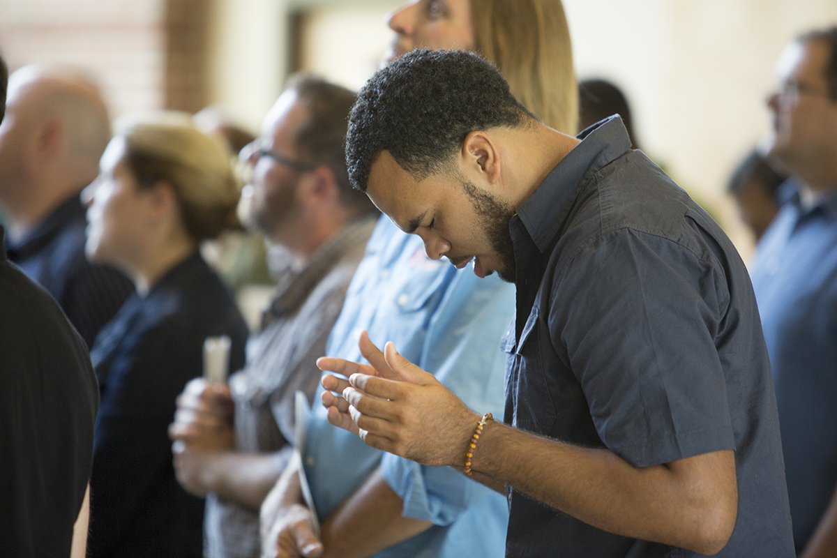 person praying at seminary